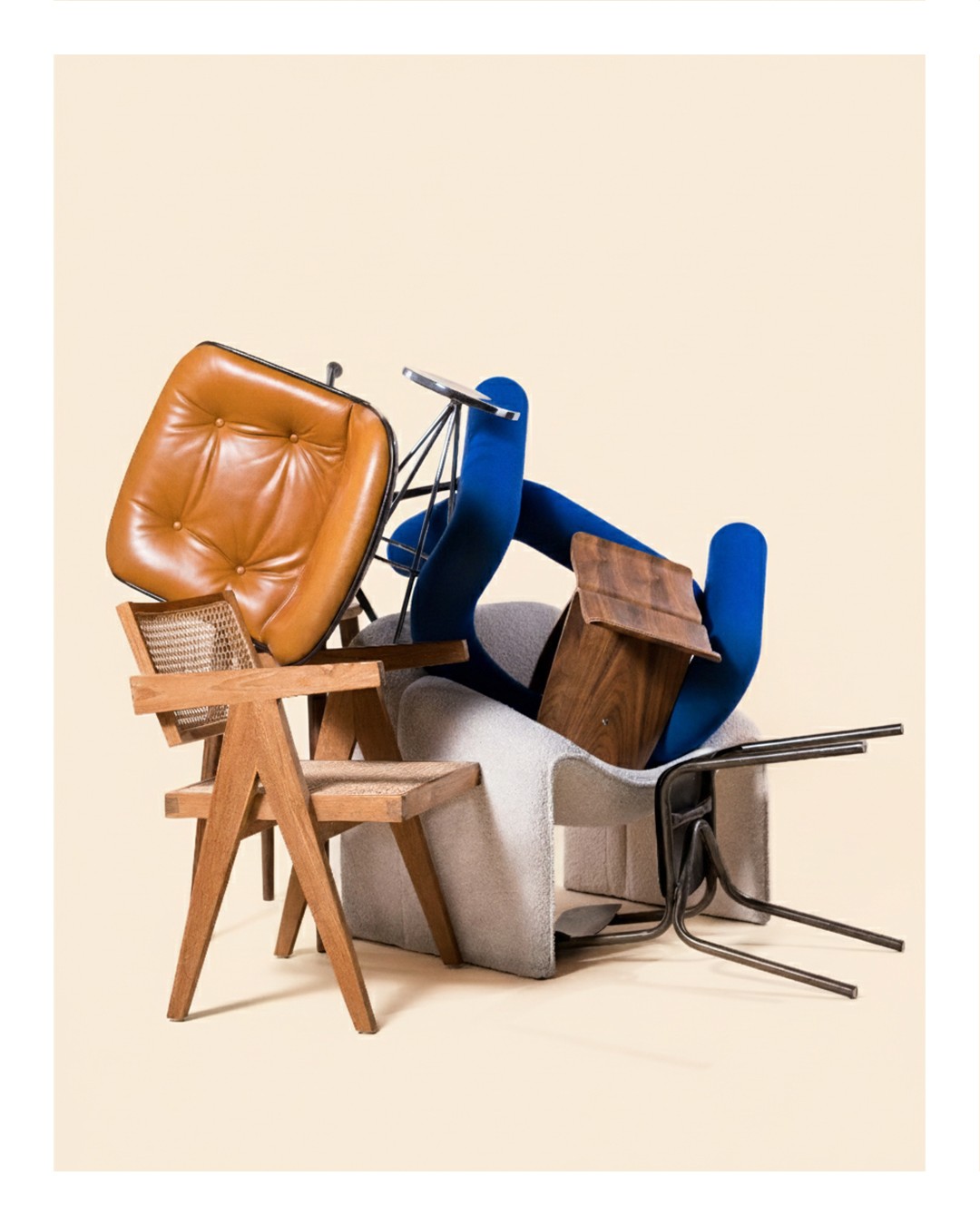 Colourful bags and shoes arranged on a chair